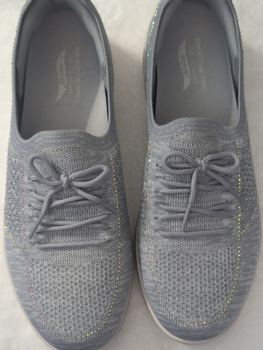 Skechers Women's Light Blue Knit Slip-On Shoes with Subtle Sparkle